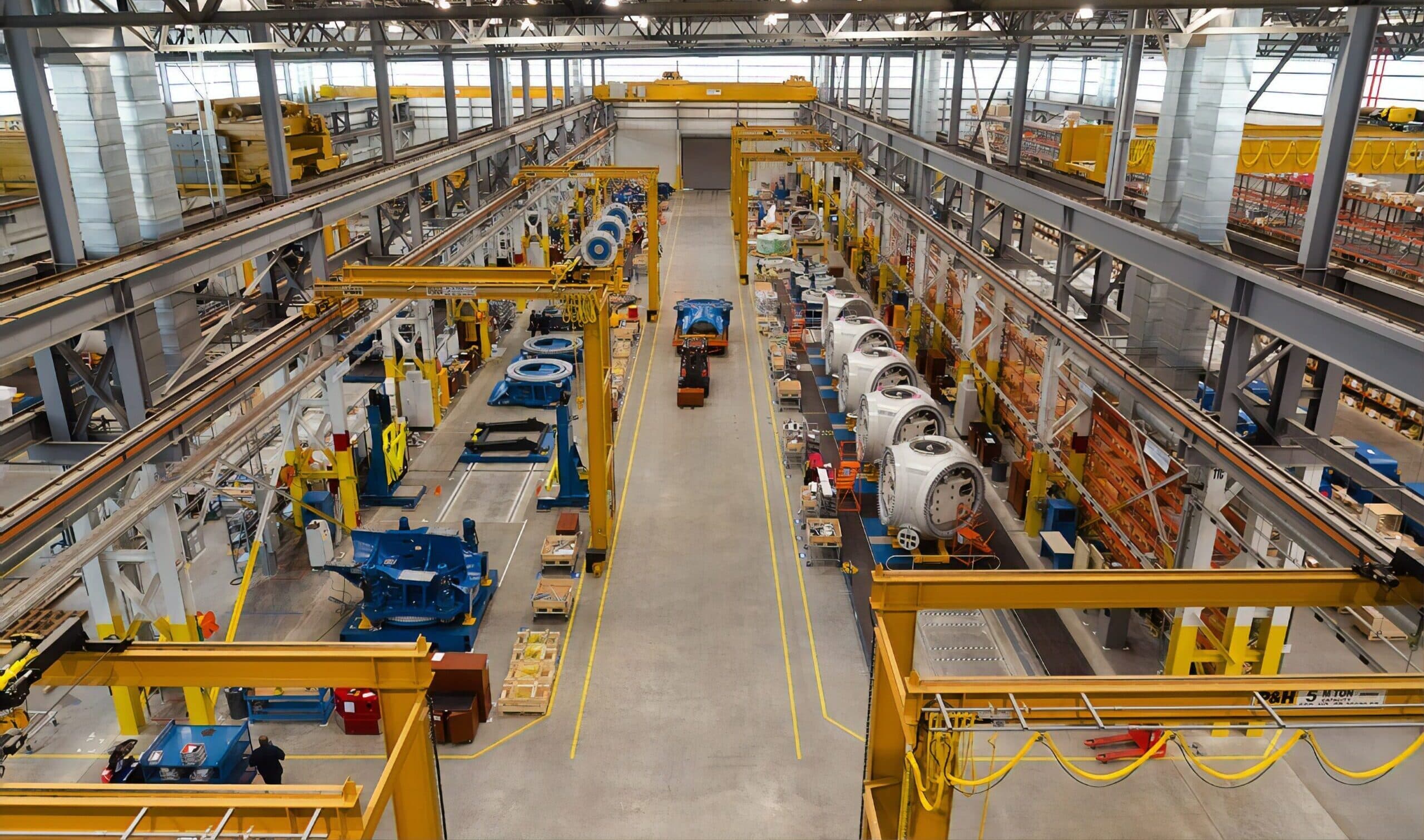 A view of the factory's industrial line inside the steel-framed hall.
