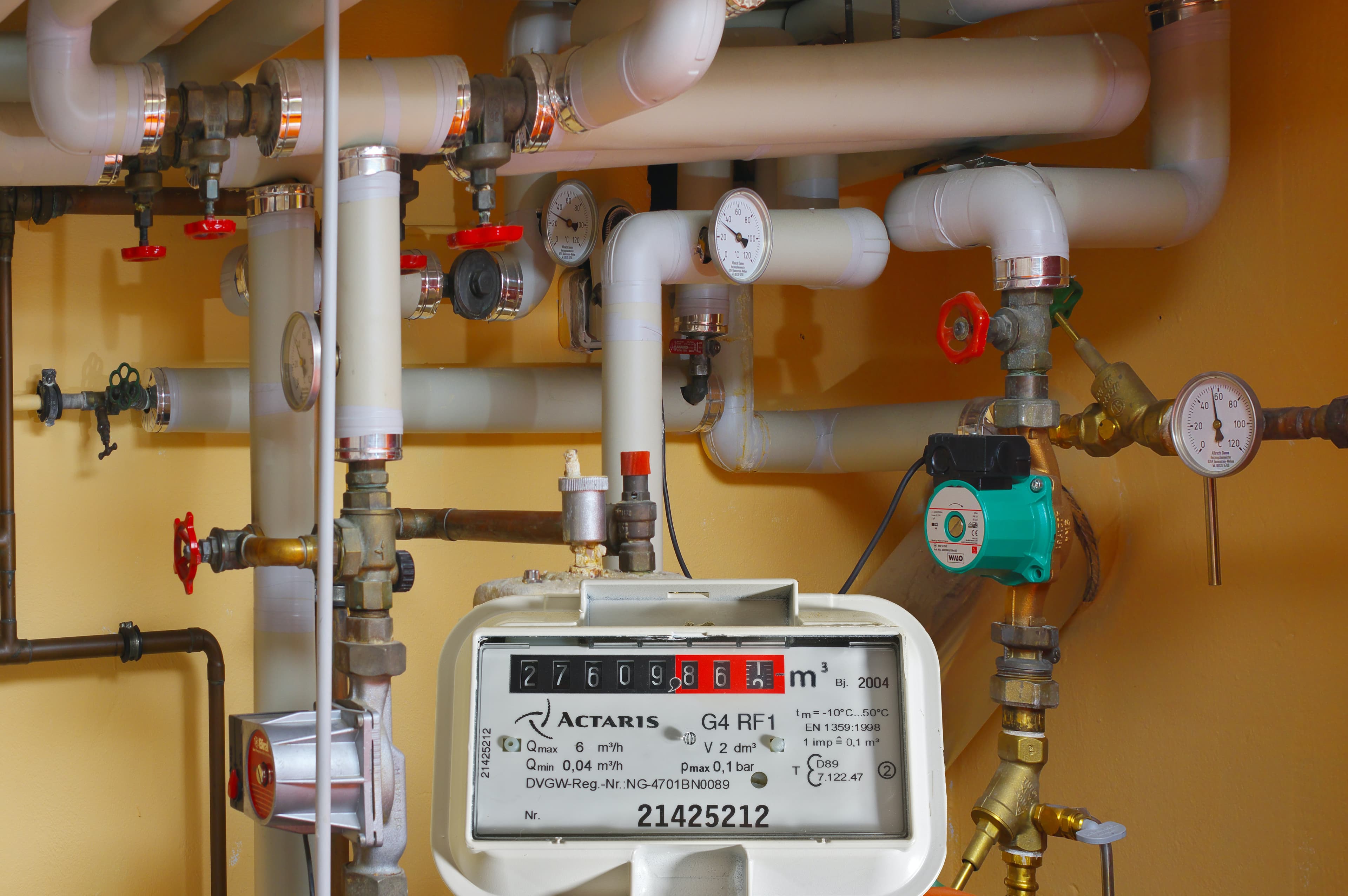 Collection at the meter and pipes in the heating or water system.