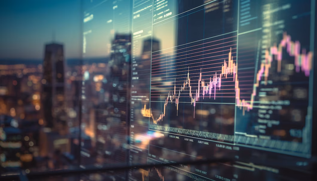 Ekran komputera wyświetlający wykres finansowy z napisem "Finanse", symbolizujący analizę danych i trendy ekonomiczne.